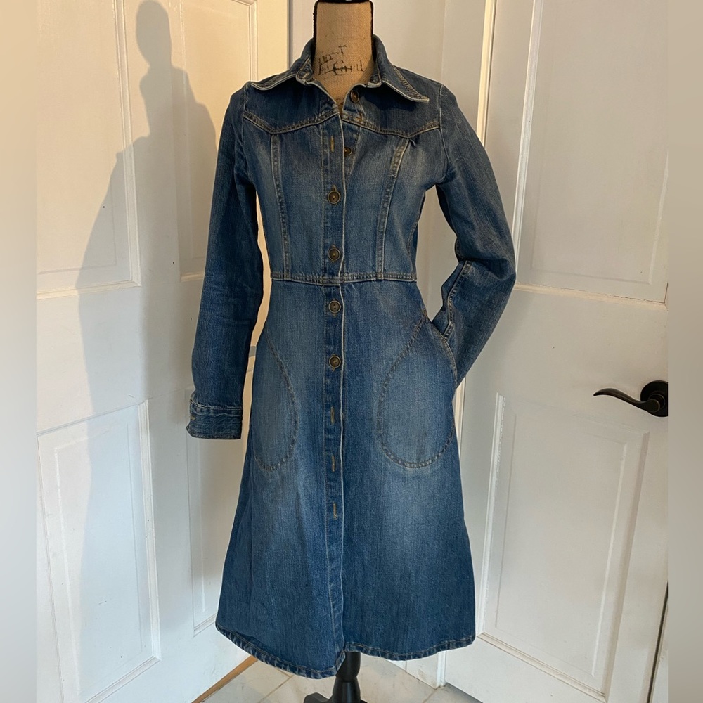 Long denim coat. Preowned in great condition. Barely used.